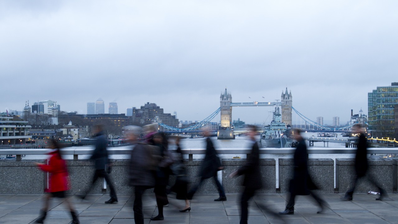 city workers going to work by Tower Bridge