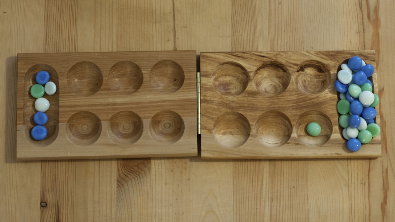 mancala, traditional board game