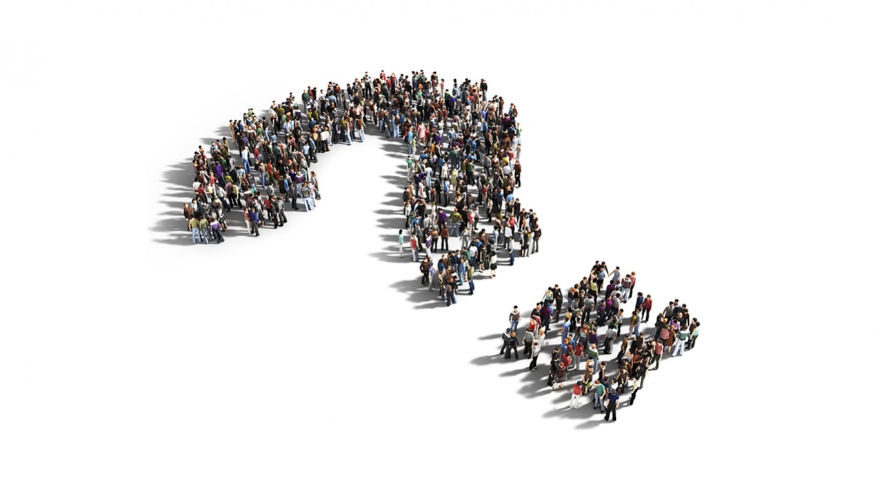 people standing in question mark shape