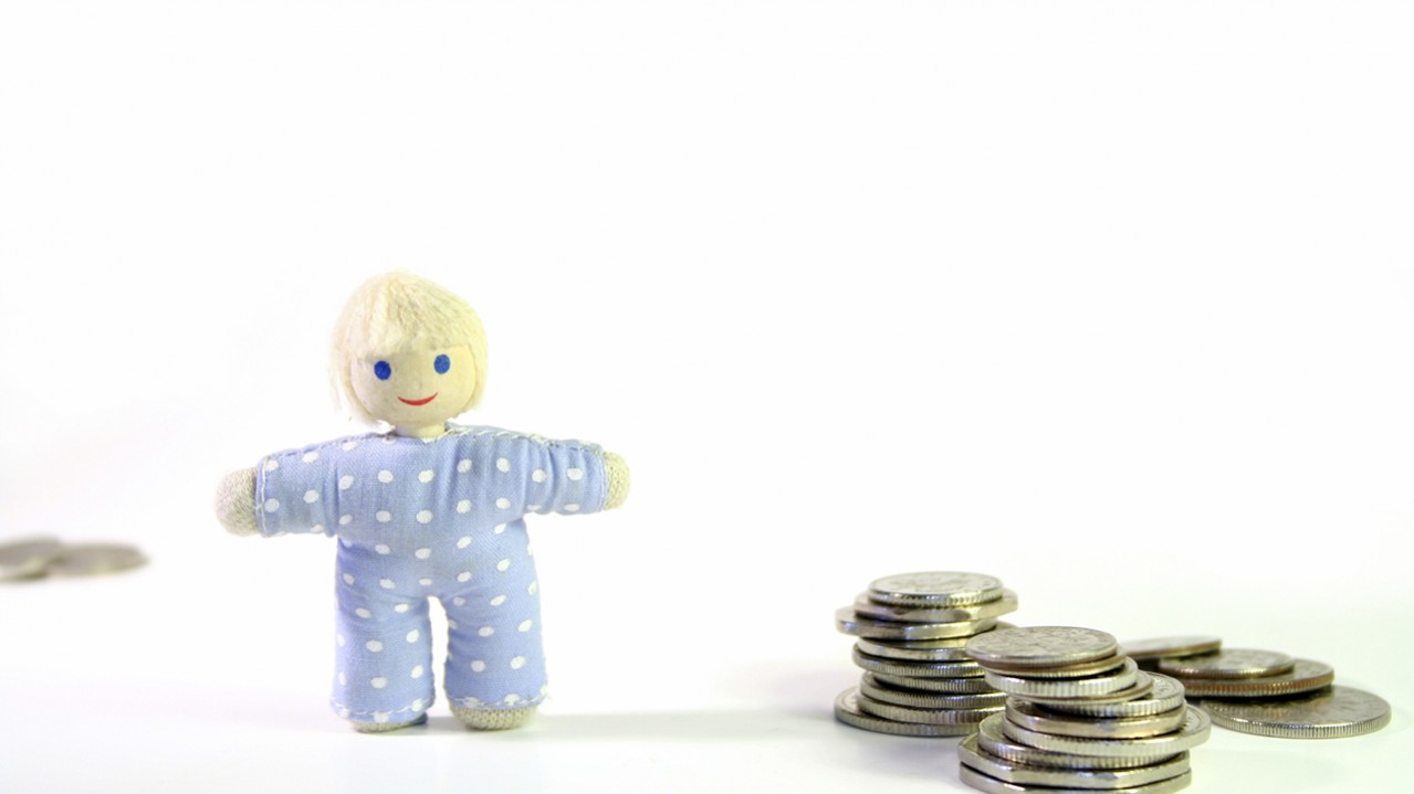 Soft doll with coins