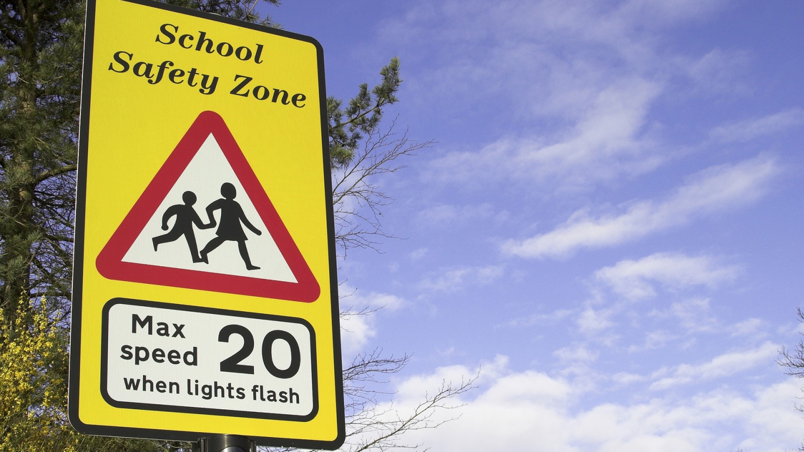 Safety road sign at a school