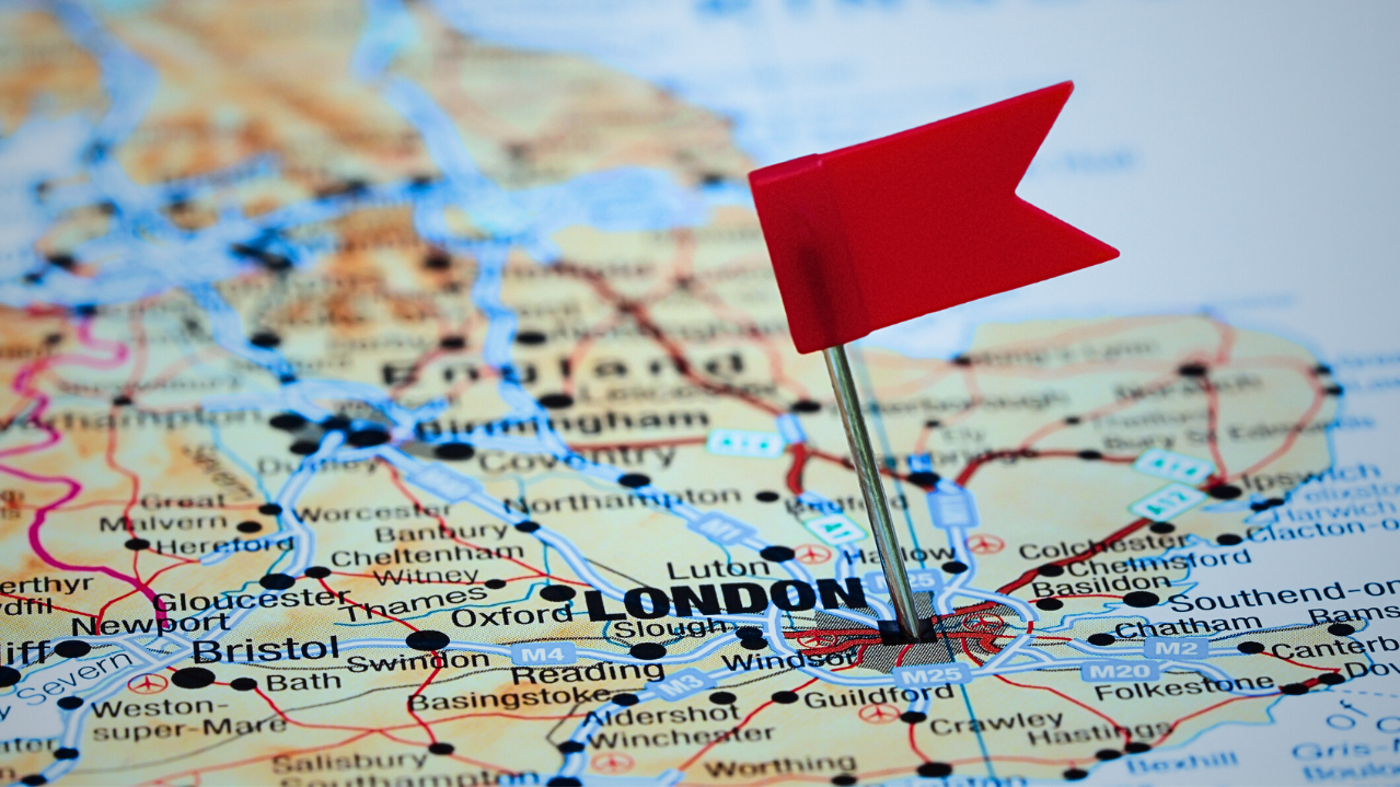 A red flag is pinned into London, on a map of the UK